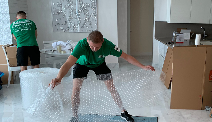 a man using wrapping material