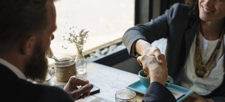 A handshake between two people.