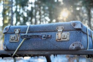 A blue suitcase. 