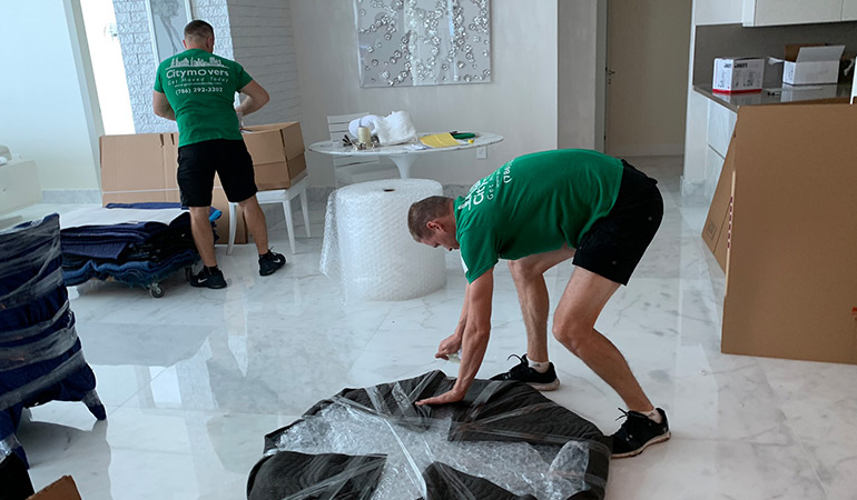 movers Pembroke Pines using great packing materials for a table.