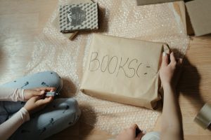 packing paper with books written on it