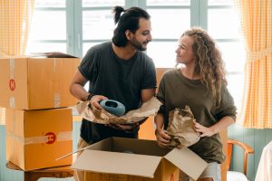 A man and a woman packing