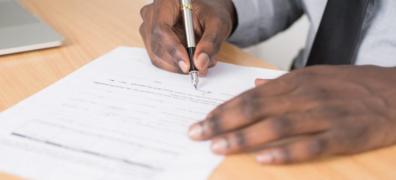 A man signing a mortgage