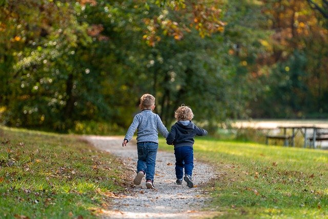 two boys running - have fun in Lighthouse Point