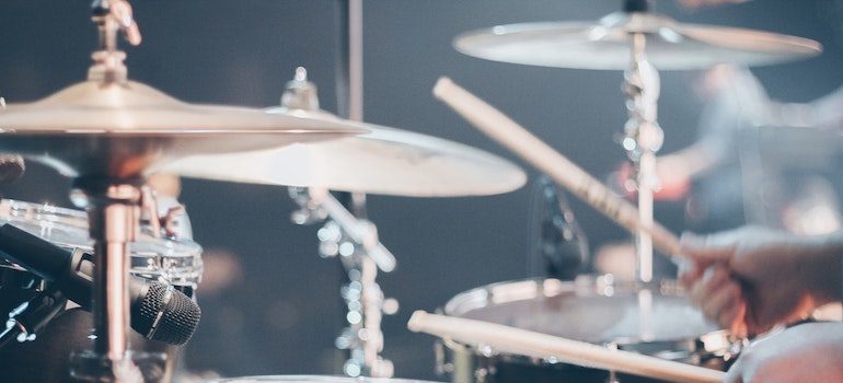 man playing on drums