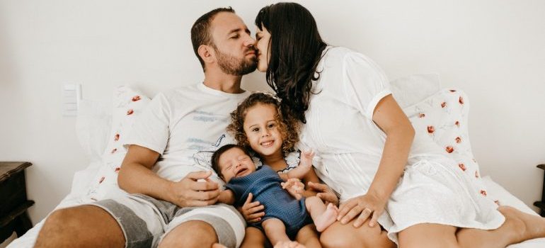 Happy family on the bed