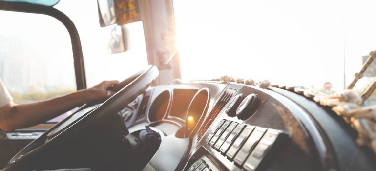 Man behind the steering wheel in a truck