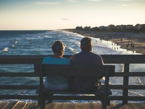 An elderly couple at the beach