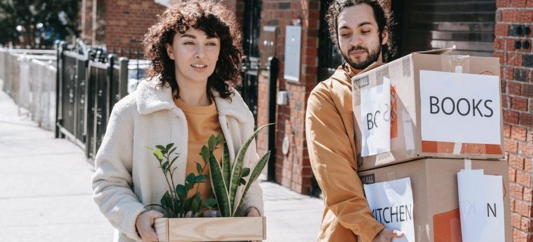 A couple with moving boxes