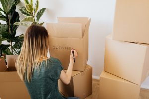Declutter your Boca Raton home by packing your belongings.