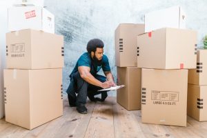 Movers lookin at boxes