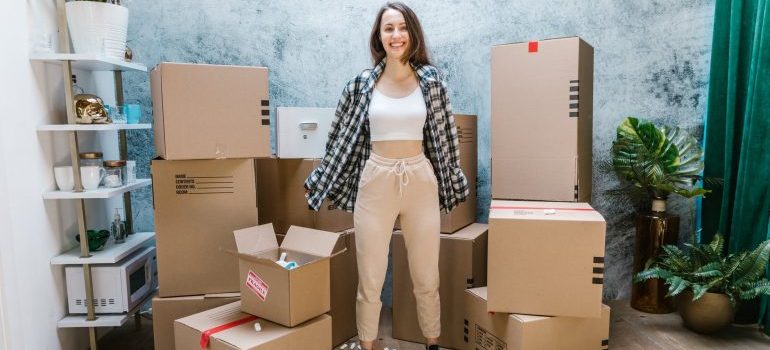 Girl surrounded by boxes