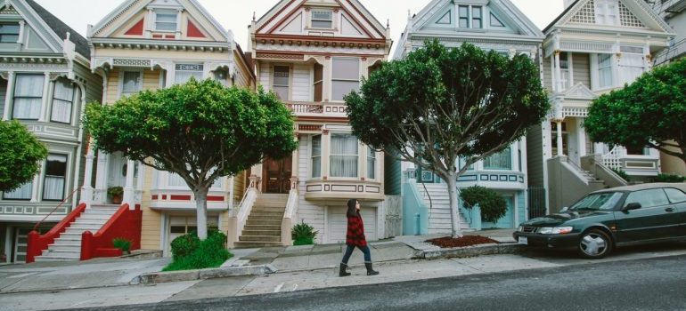 A woman walking and thinking where to move to when you get tired of living in Miami