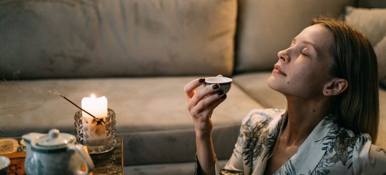 Woman relaxing with candle