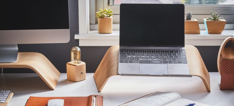 home office table with a laptop