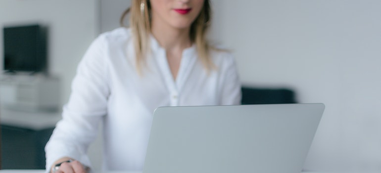 a woman working on her laptop