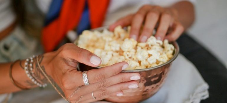 woman eating popcorn