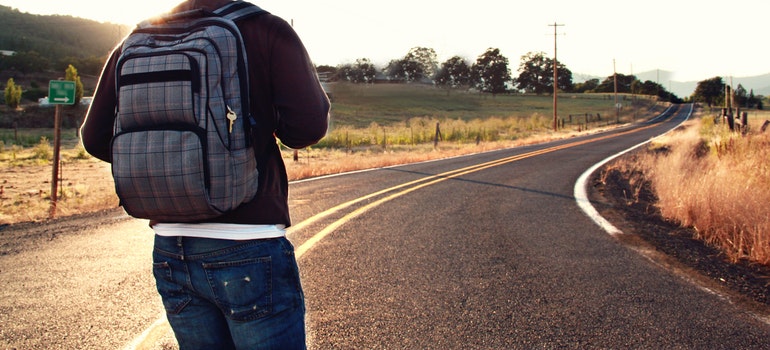 a man carrying a backpack