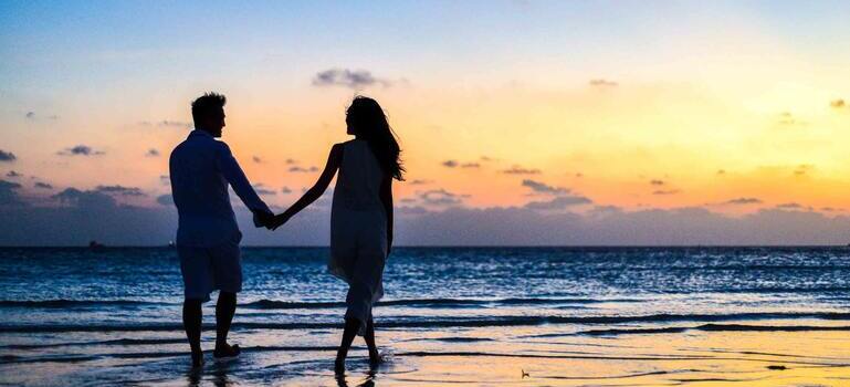 celebrate Valentine's Day after moving to Miami by walking on the beach