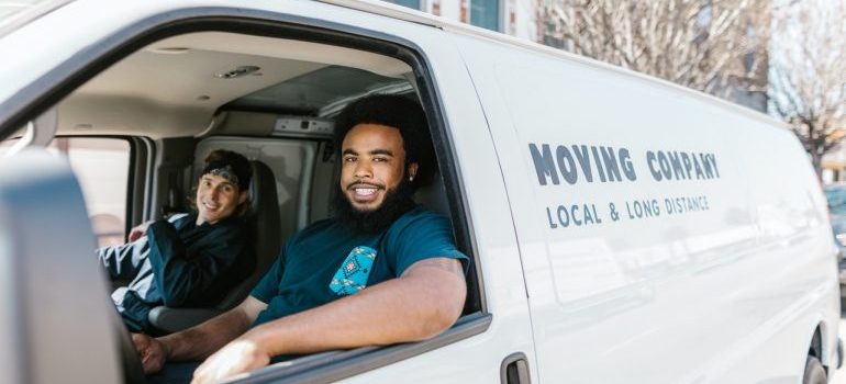 two man in a moving van