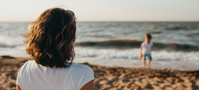 A woman and a child on the beach