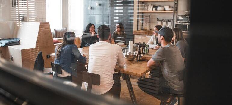 Young people in an office meeting.