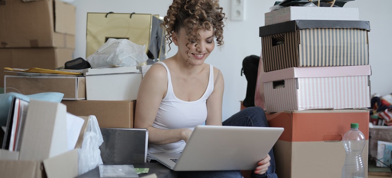 women decluttering her home before renting storage when moving from Kings Point to Lake Worth