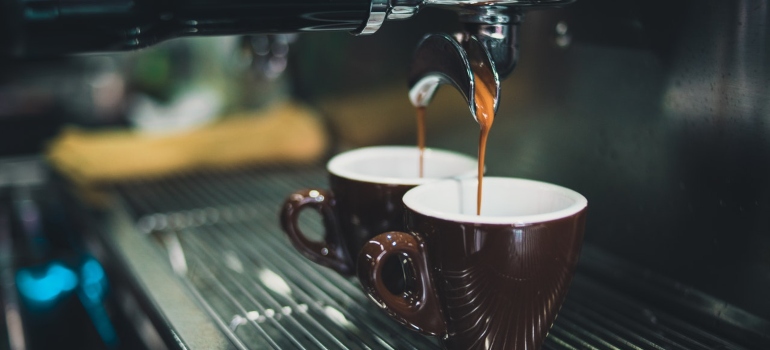 Coffee machine pouring coffee