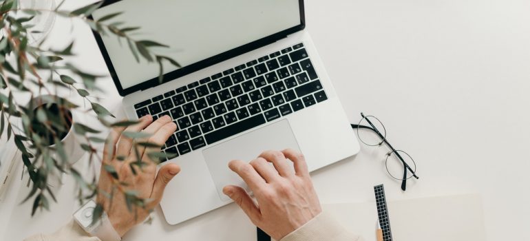 A person using a Macbook.