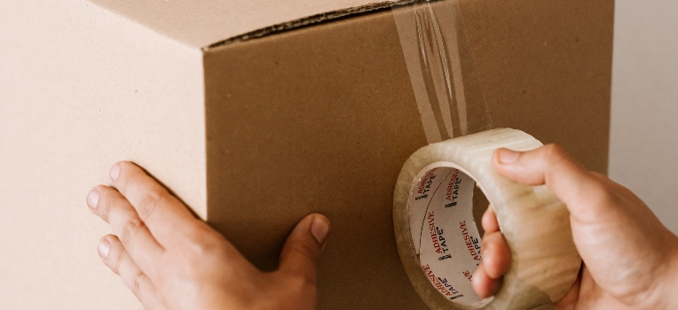 Taping a cardboard box having in mind the importance of quality packing supplies