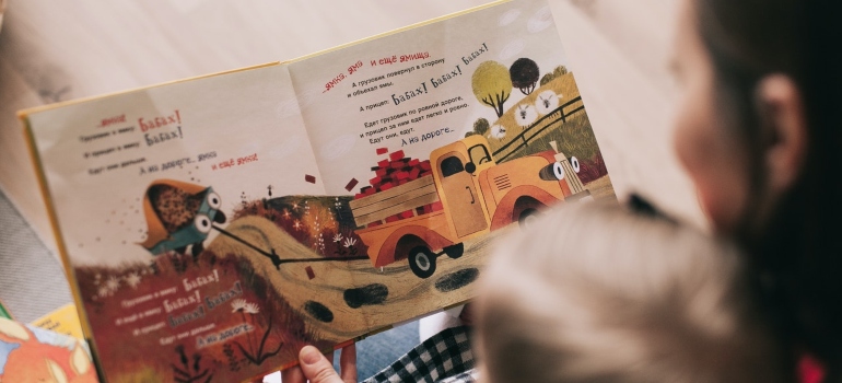 mother reading to her kid