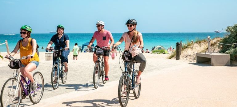 people on bicycles in one of the Best places to live in Miami area