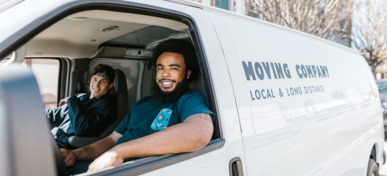 two men in a white van