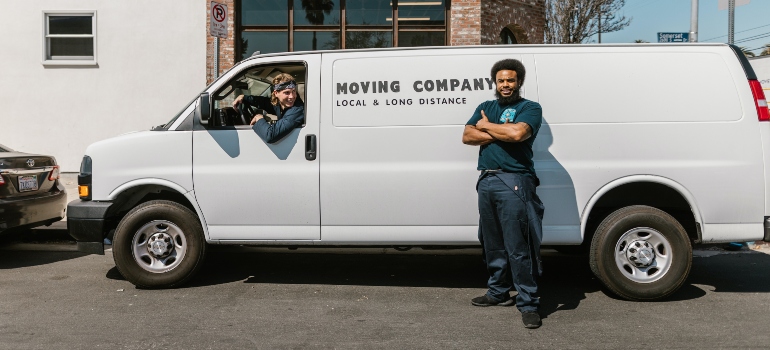 two guys and a moving company vehicle