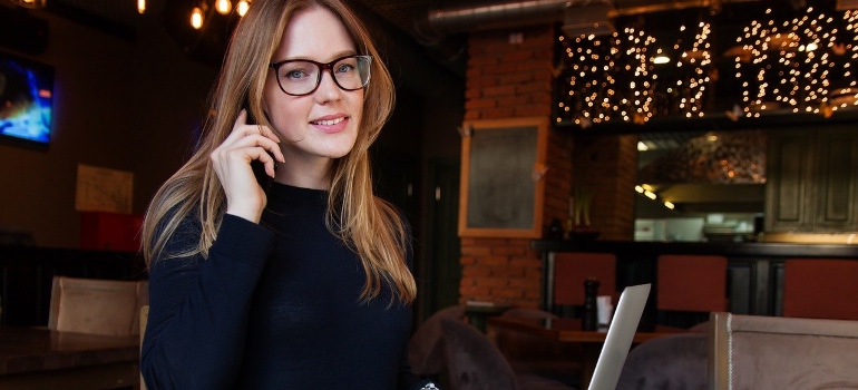 A woman making a phone call