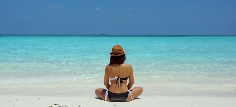 A woman relaxing on the beach