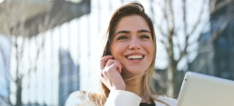 happy woman talking on her phone