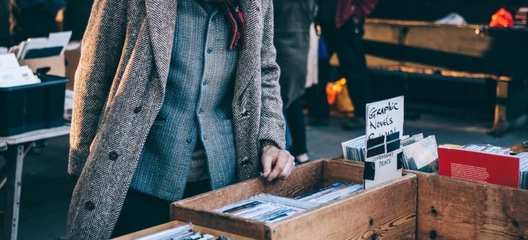 a man shopping at a yard sale 