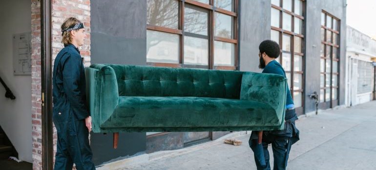 movers carrying a couch