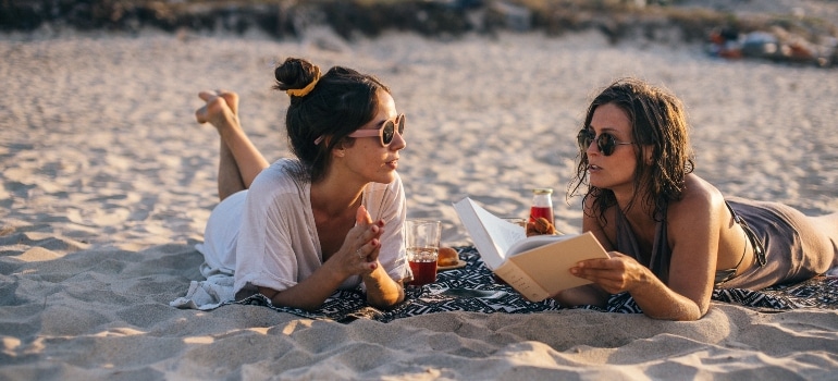 two women discussing what is Boca Raton most famous for?