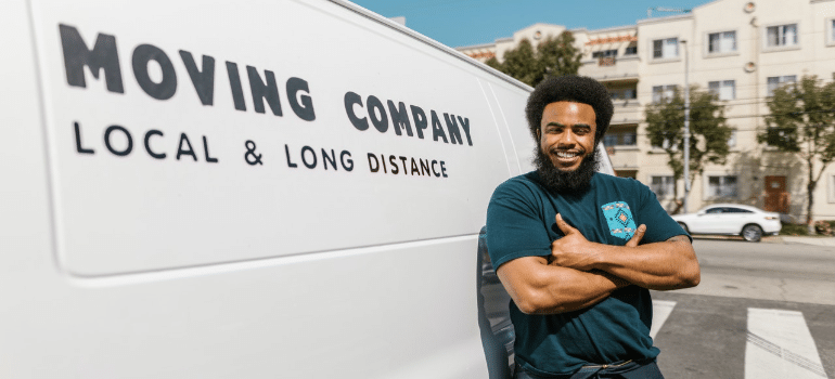 a man in front of a moving company