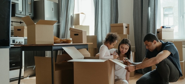 family waiting for Upper Eastside movers