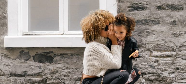 Woman talking to daughter