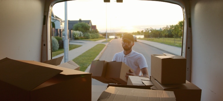 man checking boxes and wondering where to open a restaurant in Florida