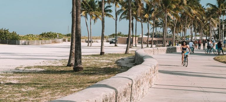 people riding bike in Miami Beach known as one of most bikeable neighborhoods in Miiami