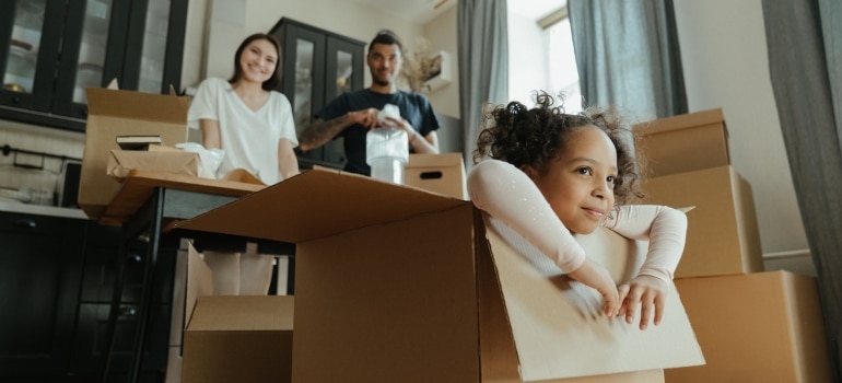 A family with moving boxes