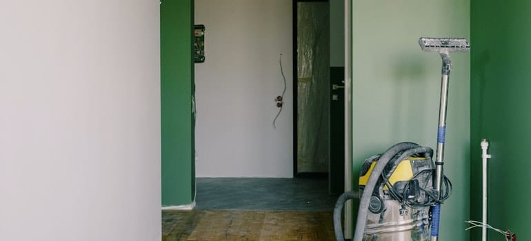 a vacuum cleaner to clean new Miami apartment before moving in