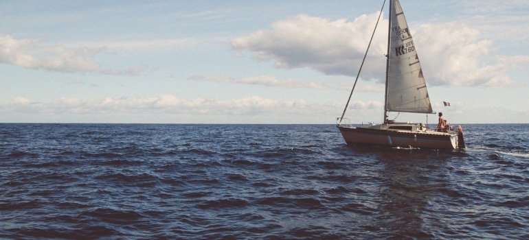 A boat on sea, which is a good way to spend your first week of living in Hallandale Beach