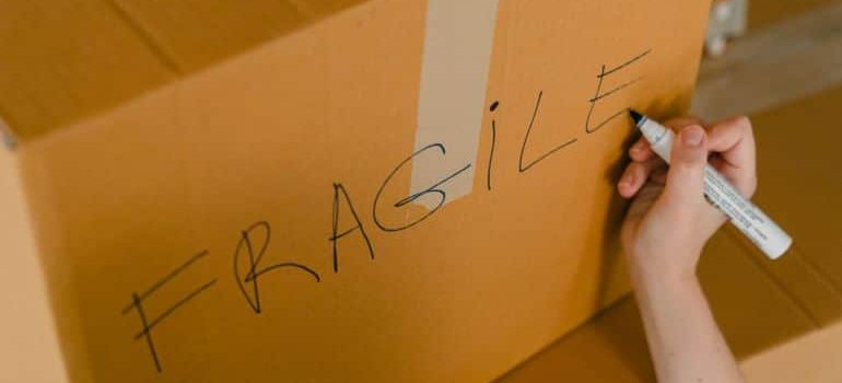 protect your fine art when moiving out of Florida by writing the word fragile on the box