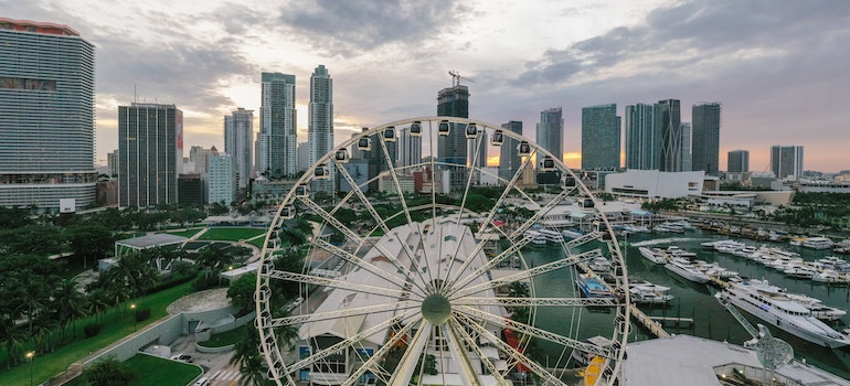 Feris wheel in front of buildings